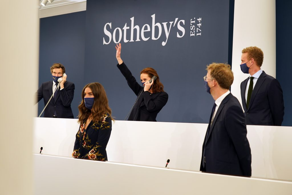 Sotheby's Holds A Cryptocurrency Auction For A Rare Ferrari Supercar.